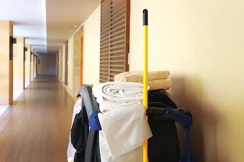 hotel cleaning cart in hallway