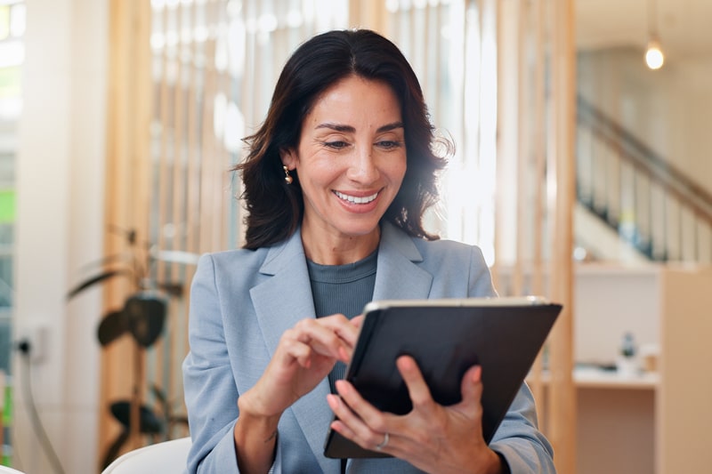 hotel manager using tablet