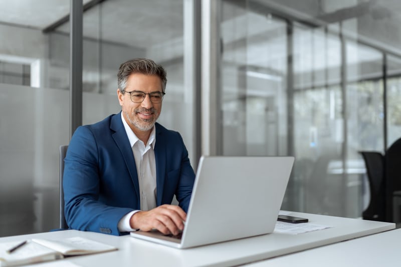 hotel owner looking at computer