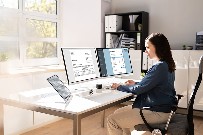woman working on invoices