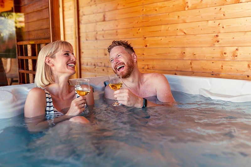 hotel guests in a hot tub